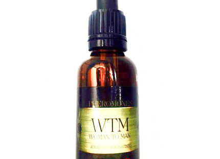 Dunkle bernsteinfarbene glasflasche mit schwarzem tropfverschluss und goldfolie etikett wtm woman to man pheromone 30 ml