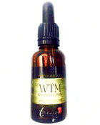 Dunkle bernsteinfarbene glasflasche mit schwarzem tropfverschluss und goldfolie etikett wtm woman to man pheromone 30 ml