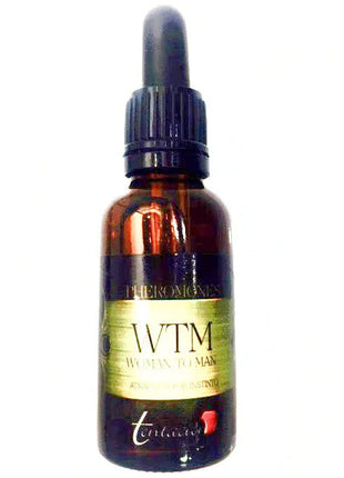 Dunkle bernsteinfarbene glasflasche mit schwarzem tropfverschluss und goldfolie etikett wtm woman to man pheromone 30 ml