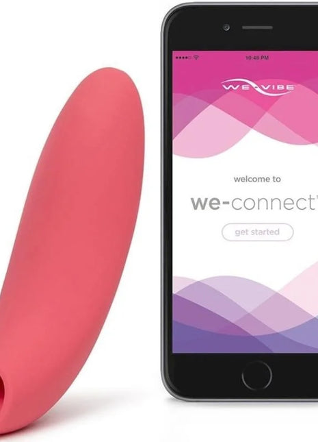 Pinkes silikon we-vibe melt sucker app pleasure device neben smartphone mit der we-connect app angezeigt