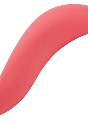 Ein schlanker coral-pinker silikonlöffelrest mit glattem, geschwungenem design für we-vibe melt sucker app