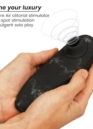 Womanizer marilyn monroe classic 2 klitoral stimulator aus schwarzem marmor mit ergonomischem design