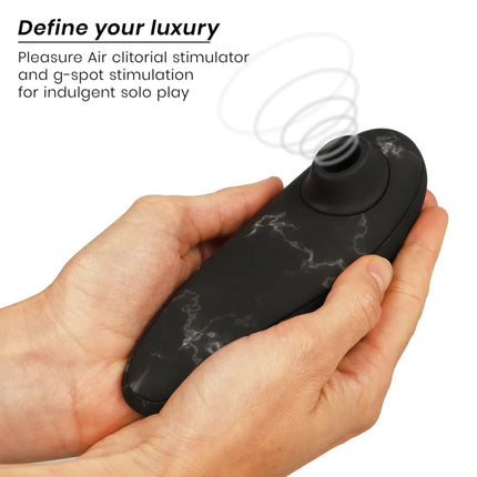 Womanizer marilyn monroe classic 2 klitoral stimulator aus schwarzem marmor mit ergonomischem design
