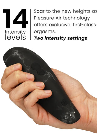 Schwarzer marmorierter womanizer marilyn monroe classic 2 klitoralstimulator mit zwei runden bedientasten