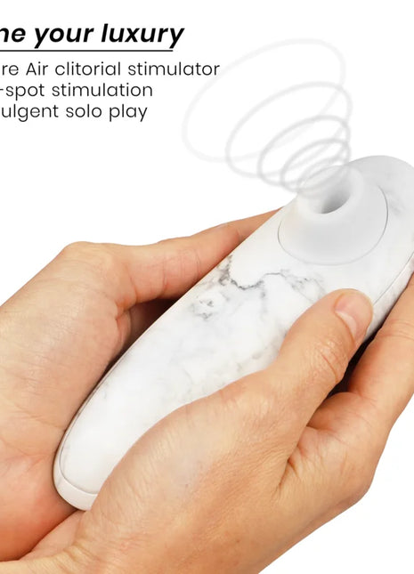 Weißer marmorierter womanizer marilyn monroe classic 2 klitoralstimulator mit ergonomischem design