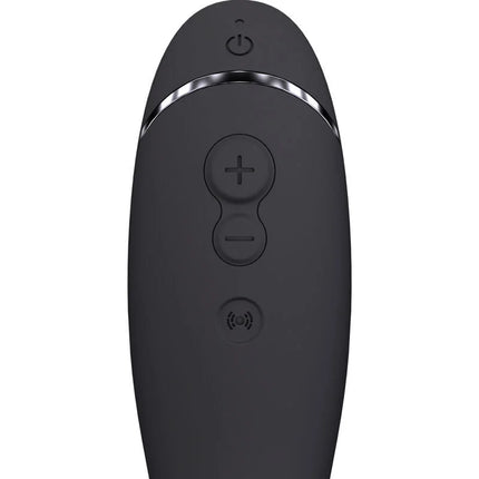 Womanizer OG G spot schiefer remote control in black matte finish with silver trim and three circular buttons