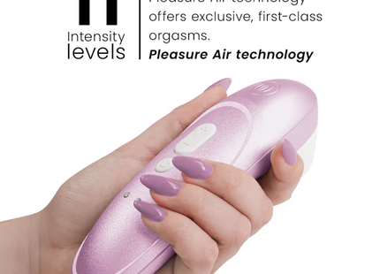 Womanizer pro vibrant klitoralstimulator in pink metallic mit weißen steuerungstasten und ergonomischem design