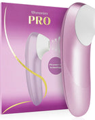 Womanizer pro vibrant klitoralstimulator in rosa und weiß mit ergonomischem design für intensive stimulierung