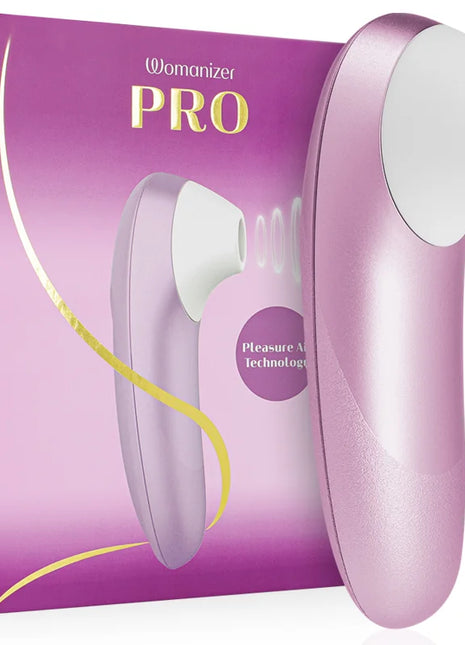 Womanizer pro vibrant klitoralstimulator in rosa und weiß mit ergonomischem design für intensive stimulierung