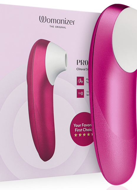 Womanizer pro klitoralstimulator in leuchtendem pink mit weißem kopf und ergonomischem design