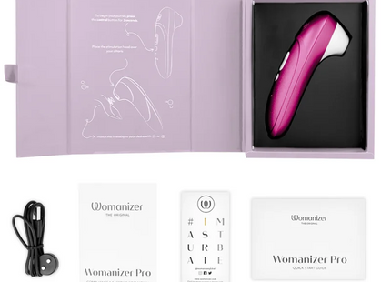 Womanizer pro vibrant klitoralstimulator in pink und weiß mit schlankem ergonomischem design