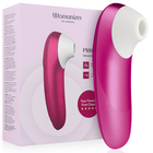 Womanizer pro klitoralstimulator in leuchtendem pink mit weißem kopf und ergonomischem design