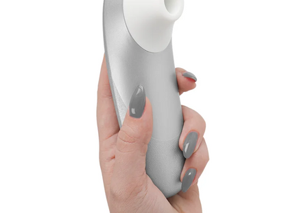 Womanizer pro vibrant klitoralstimulator silbergrau silber und weißes silikon mit ergonomischem design