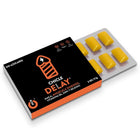 Schwarze und orange box wug sex sense cum delayer verzögerungskaugummis mit gelben rechteckigen stückchen im blister