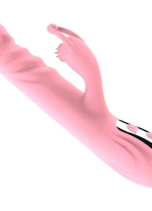 Pink silikon rabbit vibrator mit schwarzem weißem bedienfeld und pinken knöpfen zungenzauber deluxe intensiv